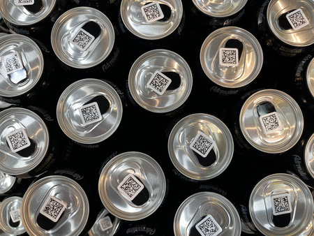 Russia, Sosnovy Bor, October 12, 2025 - Multiple beverage cans are arranged, showing QR codes on top in Sosnovy Borのeditorial素材
