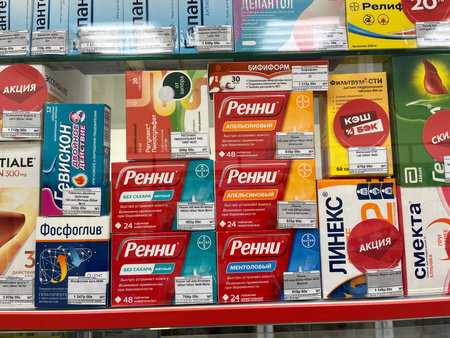 Russia, Sosnovy Bor, October 12, 2025 -Multiple medications and healthcare items are on display in a pharmacyのeditorial素材