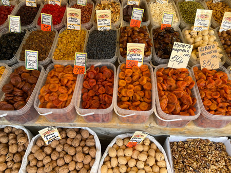 Russia, Sosnovy Bor, October 12, 2025 -Vibrant assortment of dried fruits and nuts on market shelves in Russiaのeditorial素材