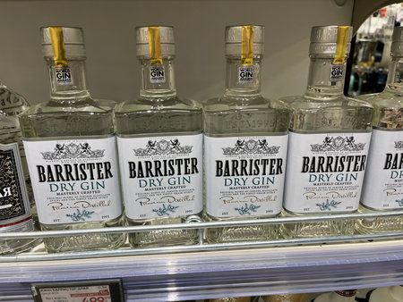 Russia, Sosnovy Bor, October 12, 2025 -Different bottles of Barrister Dry Gin are lined up on a retail shelfのeditorial素材