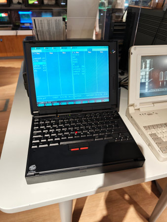 Russia, St. Petersburg, March 14, 2026 -Vintage laptop on display at a technology museum showcasing...