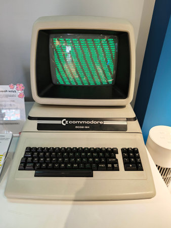 Russia, St. Petersburg, March 14, 2026 -Vintage Commodore 64 computer on display in a modern tech...