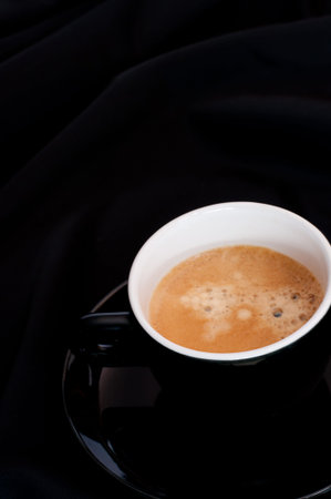 Cup of Espresso Coffee on Black Background