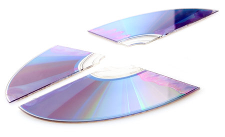 Broken CD Compact Disc on White Background