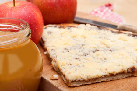 Homemade Apple Pie With Apple Jam in Jar and Apples on Tableの写真素材