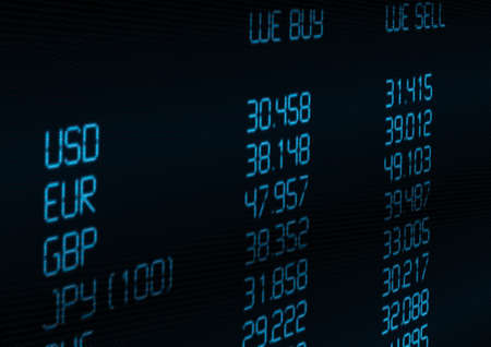 Foreign Currency Exchange Rate on Blue Displayの写真素材