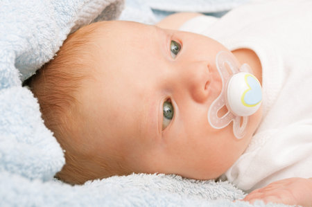 Newborn Baby in the Bed
