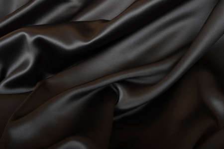 Black Texture - Dark Wavy Glossy Silk Drapery の写真素材