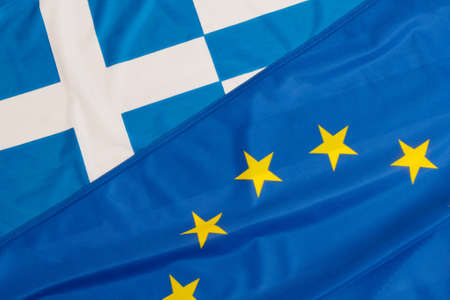 Close up of flags of European Union and Greeceの写真素材