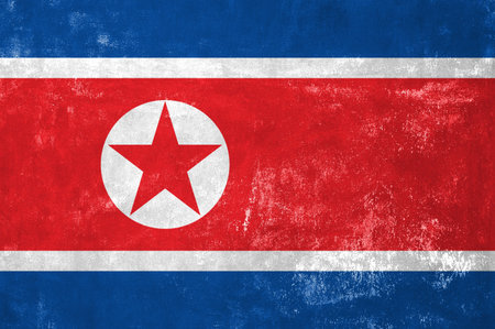 North Korean Flag on Old Grunge Texture Background