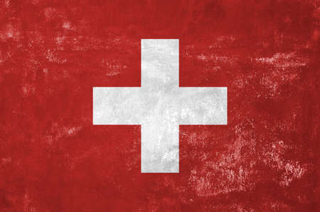 Switzerland - Swiss Flag on Old Grunge Texture Backgroundの写真素材
