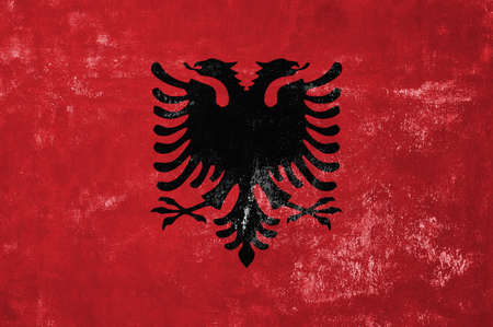 Albania - Albanian Flag on Old Grunge Texture Backgroundの写真素材