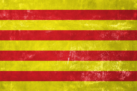Catalonia - Catalan Flag on Old Grunge Texture Backgroundの写真素材