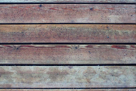Wooden Planks Background Texture with Parts of Sandの写真素材