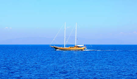 Sailing yacht in the sea without sailの写真素材