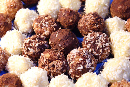 Hand Made Sweets brown and white candies with cocoa and coconutの写真素材