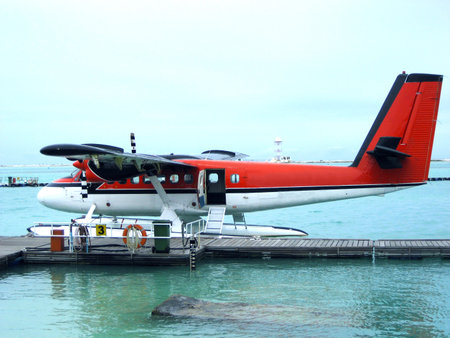 This is a photo of a seaplane of the Maldivian air taxi! It is a perfect photo for themes of aerial,...