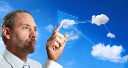 Businessman works with Virtual Cloud Computerの写真素材