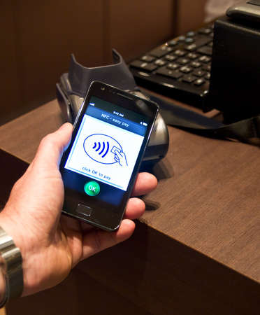 The new way to pay  NFC payments via mobile phone, etcのeditorial素材