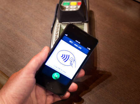 The new way to pay  NFC payments via mobile phone, etcのeditorial素材
