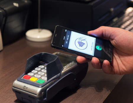 The new way to pay  NFC payments via mobile phone, etcのeditorial素材