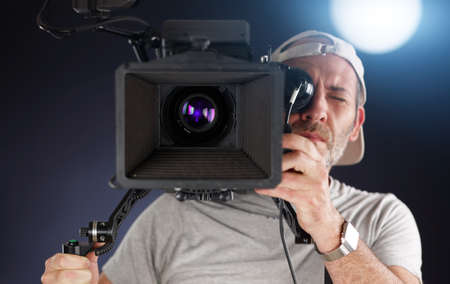 cameraman working with a cinema cameraの写真素材