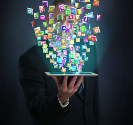 tablet pc with cloud of application iconsの写真素材