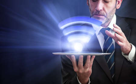 Li-Fi W-Lan technology, internet and networking concept - Businessman activates Li-Fi High speed connectionの写真素材