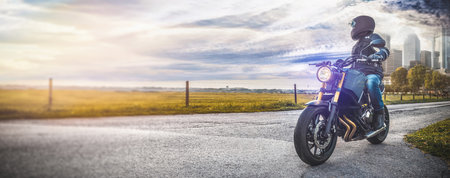 motorbike on the road riding. having fun driving the empty road on a motorcycle tour journey....