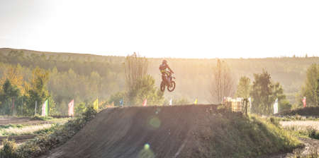 Arnoldsweiler, Germany, October 05,2017: Extreme Motocross MX Rider riding on dirt track on a sunny late summer day on public training session in preparation for motocross event.のeditorial素材