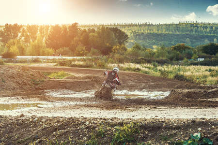 Arnoldsweiler, Germany, October 05,2017: Extreme Motocross MX Rider riding on dirt track on a sunny late summer day on public training session in preparation for motocross event.のeditorial素材