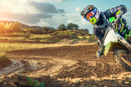 Arnoldsweiler, Germany, October 05,2017: Extreme Motocross MX Rider riding on dirt track on a sunny late summer day on public training session in preparation for motocross event.のeditorial素材