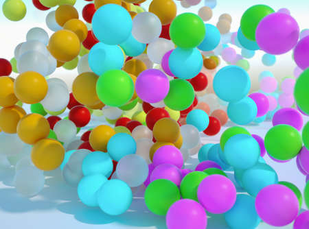 colorful bouncing balls outdoors against blue sunny skyの写真素材