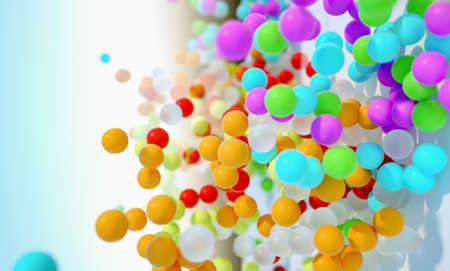 colorful bouncing balls outdoors against blue sunny skyの写真素材