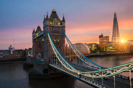 The London Tower bridge at sunset on a sunny summer evening  - shot against blue clear sky into the shining sunのeditorial素材