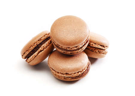 Fresh bright colored Macarons, or macaroons isolated on white backgroundの写真素材