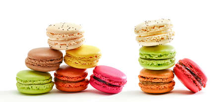 Fresh bright colored Macarons, or macaroons isolated on white backgroundの写真素材