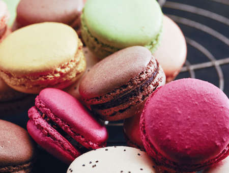 Fresh bright colored Macarons, or macaroons ready to eat at patisserieの写真素材