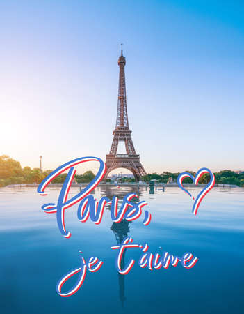 the famous paris eiffel tower on a sunny day with some morning sunshine reflects in blue waterの写真素材