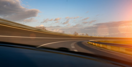 Race Car / motorcycle racetrack after rain on a sunny day. Fast motion blur effect. Ready to race