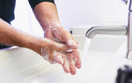 Man washing his Hands to prevent virus infection and clean dirty hands - corona covid-19 concept...
