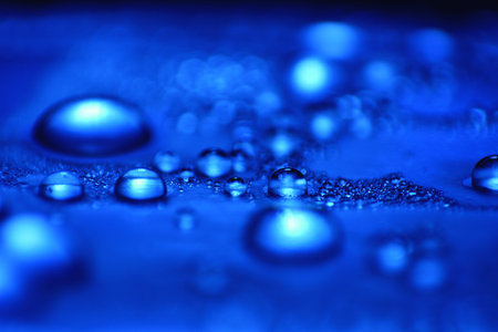Macro: Water drops in blue tone
