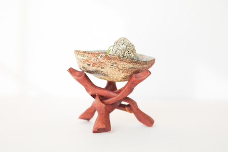 Sage Smudge Stick in a holder on white background.の写真素材