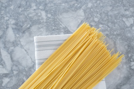 Italian food. Spaghetti pasta on light background with copy space for textの写真素材