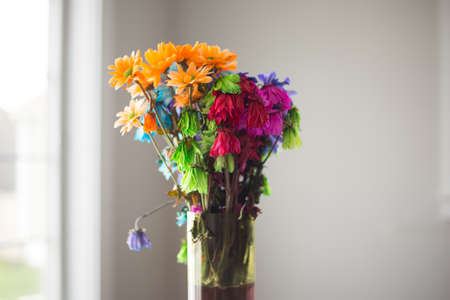 A colorful flower bouquet in a vase.の写真素材