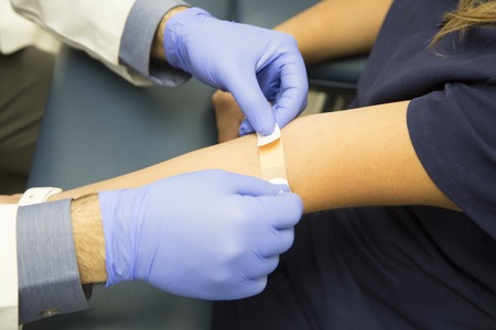 A patient getting blood work for testing.の写真素材