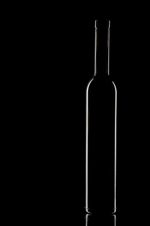 Vine bottle on the black backgroundの写真素材