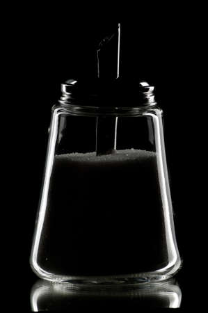 Close up sugar-basin on the black backgroundの写真素材