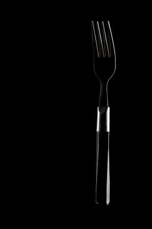 Fork on the black backgroundの写真素材