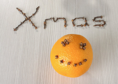 Orange with smile with text Xmas